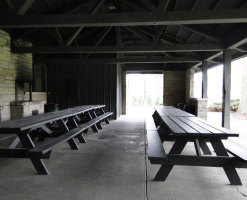 Picnic benches inside pavilion