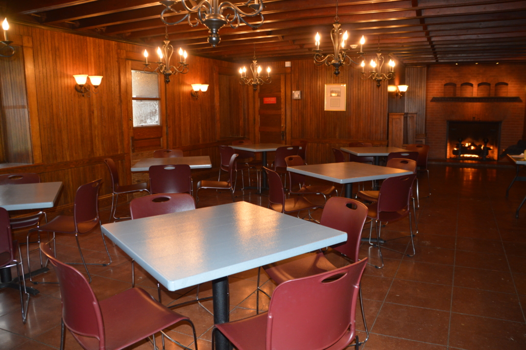 Table and chairs set up in bottom floor of Pioneer Pavilion