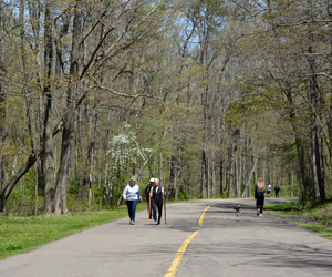 Visitors on the East Golf Hike & Bike Trail in Mill Creek MetroParks