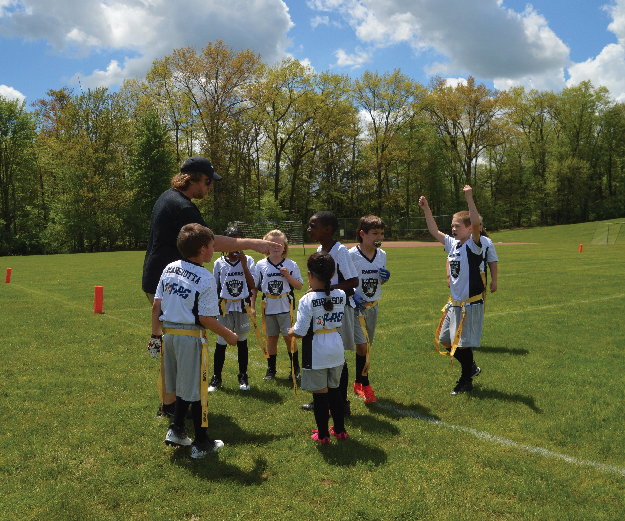 Youth playing in the NFL Flag Football League at Wick Recreation Area, Mill Creek MetroParks