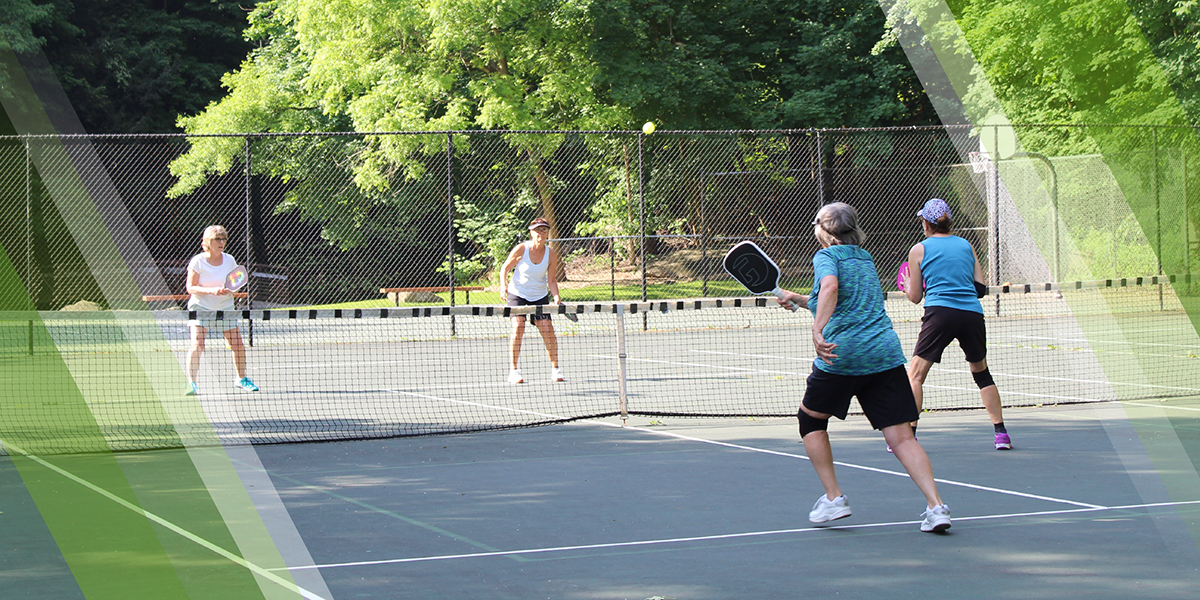 Pickleball Page Header depicting visitors playing pickleball at Yellow Creek Park, Mill Creek MetroParks